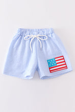 Load image into Gallery viewer, Seersucker patriotic flag applique boy swim trunks
